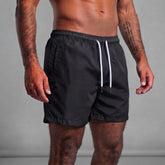 Short tactel masculino preto Overbeach, vista frontal